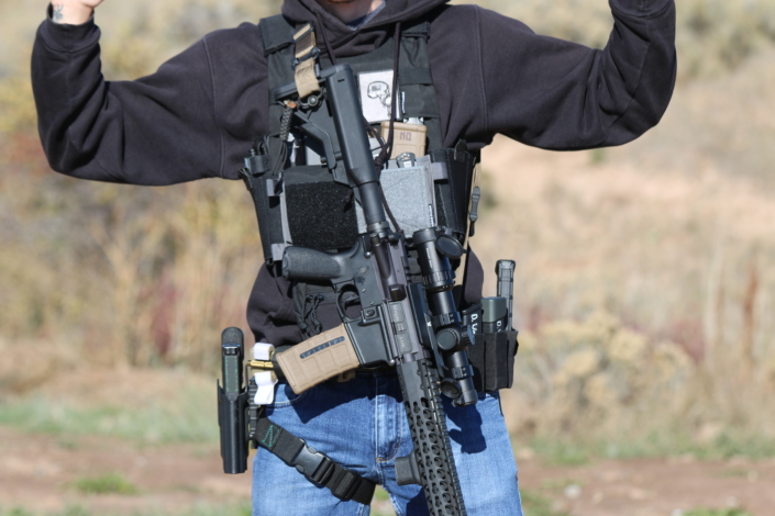 Front view ranger belt with setup and rifle