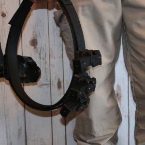 Man Holding Dominate Defense Combo Belt